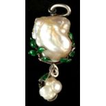 A natural saltwater blister pearl pendant, in silver mount with green enamel leaves, with another