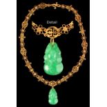 A Chinese carved jadeite gourd pendant, on gold (probably 14ct) chain link necklace with pierced