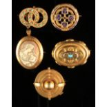 Five late 19th / early 20th century unmarked yellow metal brooches including shell cameo example &