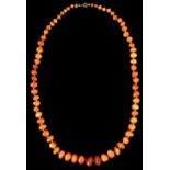 A butterscotch amber pebble bead necklace, approximately 39 grams (see illustration).