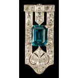 An Art Deco style diamond & rectangular emerald cut blue zircon clip brooch, 1.35ins. (3.4cms.) long