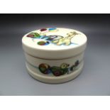 Ceramics - A Moorcroft Pottery Circular Box and Cover in The Nursery Design, shape 125/4, designed