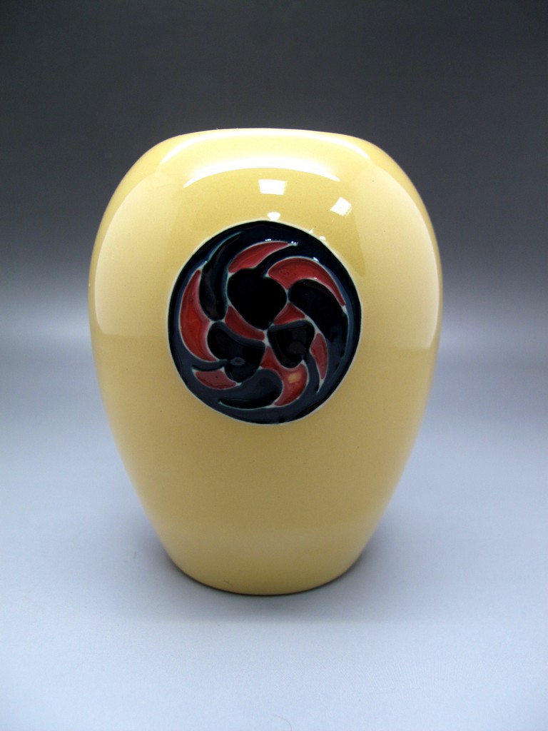 Ceramics - A Moorcroft Pottery Vase in the Flamminian Design, shape 102/3, decorated with blue and