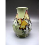 Ceramics - A Moorcroft Pottery Vase in the Magical Toadstool Design, shape 7/3, designed by Kerry