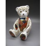 Ceramics - A Royal Crown Derby Seated Teddy Bear Paperweight, with imari waistcoat and pads and blue