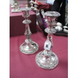 A Pair of XIX Century Plated Candlesticks, each of circular form with acanthus leaf decoration, on