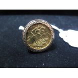 Elizabeth II Sovereign, 1964, loose set within 9ct gold ring mount.