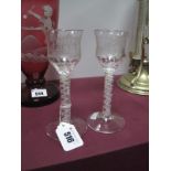 A Pair of Early XX Century Wine Glasses, in the Georgian style, each with an ogee bowl, wheel