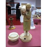 A Royal Worcester China Figure of an Eastern Water Carrier, after James Hadley, printed mark and