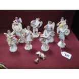 A Part Set of Nine Early XX Century Dresden Porcelain Figures, emblematic of signs of the zodiac,