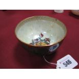 An Early XX Century Wedgwood Butterfly Lustre Bowl, printed, painted and gilt on a marbled green