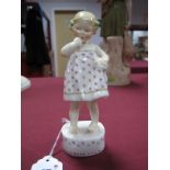 A Royal Worcester China Figure, "Only Me", after a design by F.G. Doughty, 15cms high.