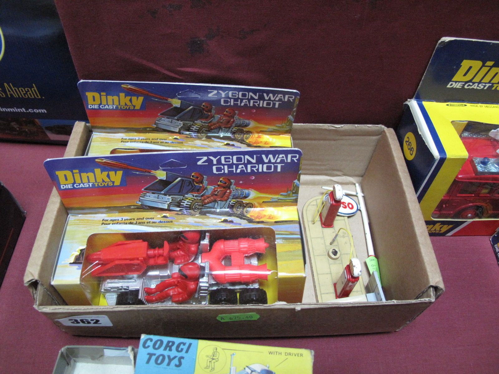 Two Boxed Dinky Zygon War Chariot, No.361 1979, silver and red version, with 1950's Dinky Esso