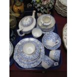 Edwardian China Tea Service, of twenty-two pieces, having blue and white fan and floral decoration