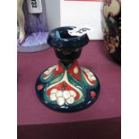 A Moorcroft Pottery Candlestick in the Golden Bough Design, from the Winter Legacy Collection, shape