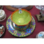 A Clarice Cliff Bizarre Fantasque Bowl, of octagonal form, "Windbells Design", (damaged), and a