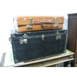 The "Alford" Trunk, with blackened hessian covering, and peerage suitcase.
