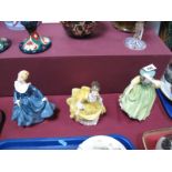 Three Royal Doulton Figurines, "Buttercup" HN2309, "Fragrance" HN2334 and "Coralie" HN2307.