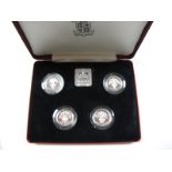 A 1984-1987 UK One Pound Silver Proof Collection.