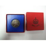 A 1935 Silver Jubilee Medal (by P. Metcalfe). This is the 32mm silver version. In the box of issue.