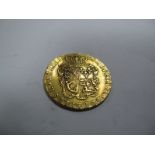 A King George II Guinea 1752. A classic coin. This example is graded Fine but is bent.