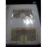 "Money of the World". A collection of foreign coins and banknotes in a presentation folder. A