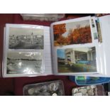 A Collection of Early/Mid XX Century Postcards, in a modern photograph album.