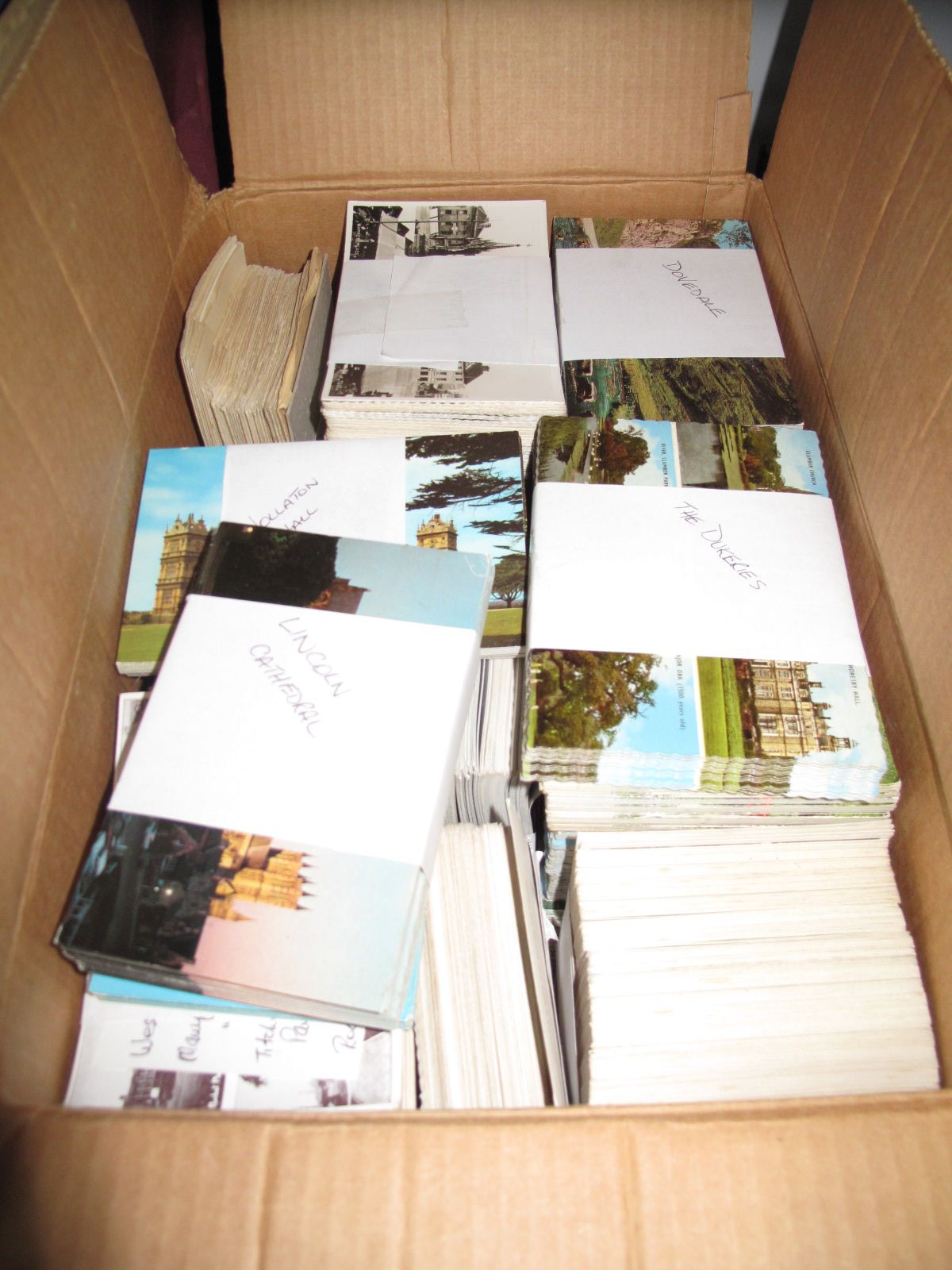 A Good but Duplicated Quantity of Modern Topographical Postcards, carefully bundled by type by the