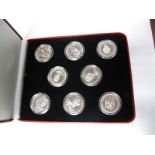 A Collection of Eight Crown Sized Coins, by the Pobjoy Mint to commemorate the life of QEII. In