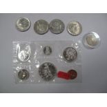 Four High Grade Kennedy Half Dollars, 1964 to 1967. A Canada six coin set, 1965. A shilling, 1887,