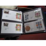 Approximately 260 GB Definitive First Day Covers, 1967-200, neatly stored in four large albums,