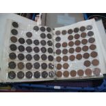 A Collection of UK Coins in an Album. The collection includes pre-1947 silver coins having a total