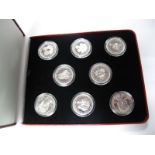 A Collection of Eight Crown Sized Coins, by Pobjoy Mint to commemorate the life of the Queen Mother.