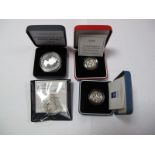 A 1994 UK Silver Proof One Pound Coin. A year 2000 Guernsey silver proof one pound coin. A 2001 UK