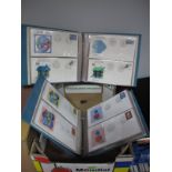 Two Smart United Nations Commemorative First Day Cover Albums. Approximately 120 graphic designed