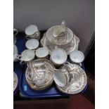 XIX Century Tea Service, including cups, saucers, milk jug, bowl, etc, all with gilt leaf