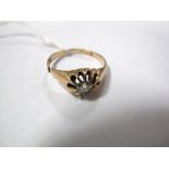 A Single Stone Diamond Ring, the old cut stone ten claw set between plain tapering shoulders,