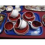 A Nineteen Piece Susie Cooper Tea Service, comprising cups, saucers and a milk jug, all decorated