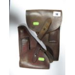 A Pair of Mid XX Century Leather Gun Holsters, (both for automatics), one has clip included.