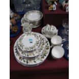 A Wedgwood Dinner Service, "Beaconsfield" pattern, comprising dinner plates, bowls, cups, saucers,