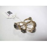 Five Modern 9ct Gold Cluster Dress Rings, claw set throughout. (6)