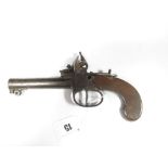 A Late XVIII Century Early XIX Century Flintlock Muff Type Pistol, with screw off barrel, lock
