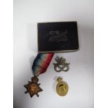 A WWI 1914 Star to 8350 Pte. H.G. Fisher, South Staffordshire Regt, plus an "On War" service badge