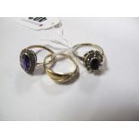 A 9ct Gold Dress Ring, together with an amethyst set oval cluster ring and another. (3)