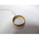 A Plain Wedding Band, indistinctly stamped "2".