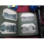 Approximately Ninety Early XX Century Postcards, in a partially filled contemporary album. The cards