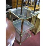 Two Brass Coffee Tables, of square form, each with octagonal supports, glass undershelf and bevelled