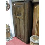 A Circa 1930's Oak Hallrobe, linen fold decoration to the door, reeded canted sides.