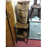 An Oak Two Heights Tea Trolley, and a basket weave corner wash basket. (2)