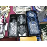 A Stuart Glass Decanter, (boxed), with a Royal Doulton decanter and wine glasses, (boxed),